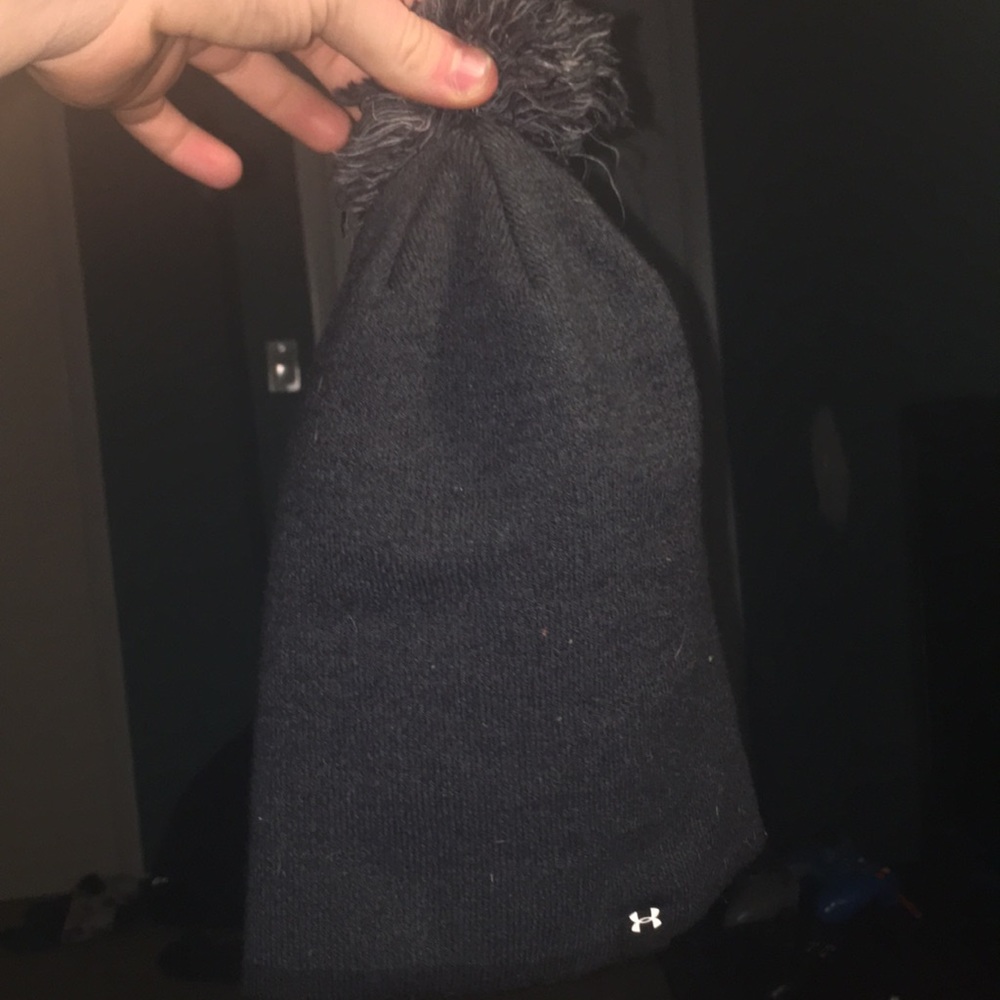 Under armor fluff ball beanie.